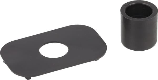 Spacer and bushing for the blade drive